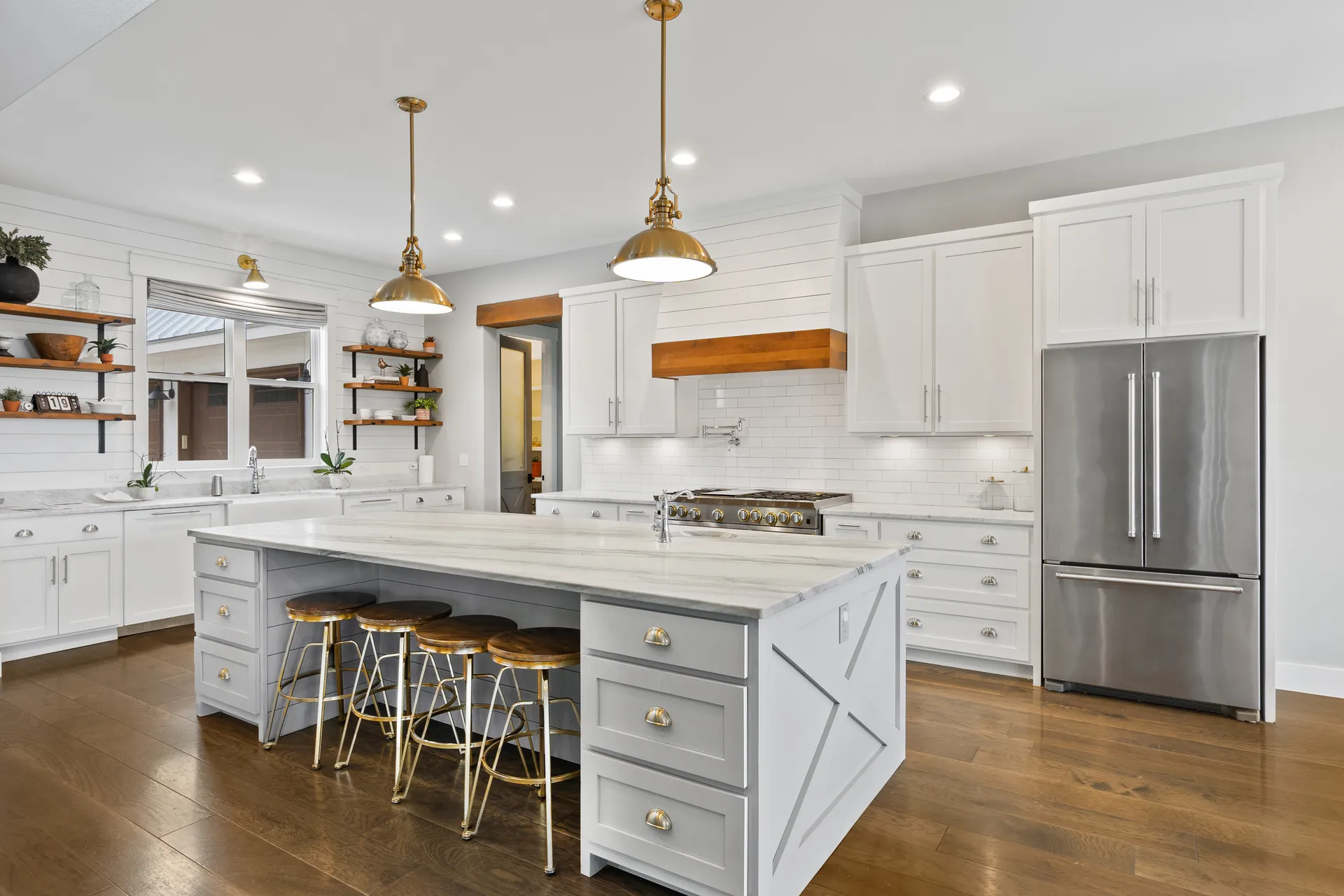 Farmhouse kitchen marble island brass pendants
